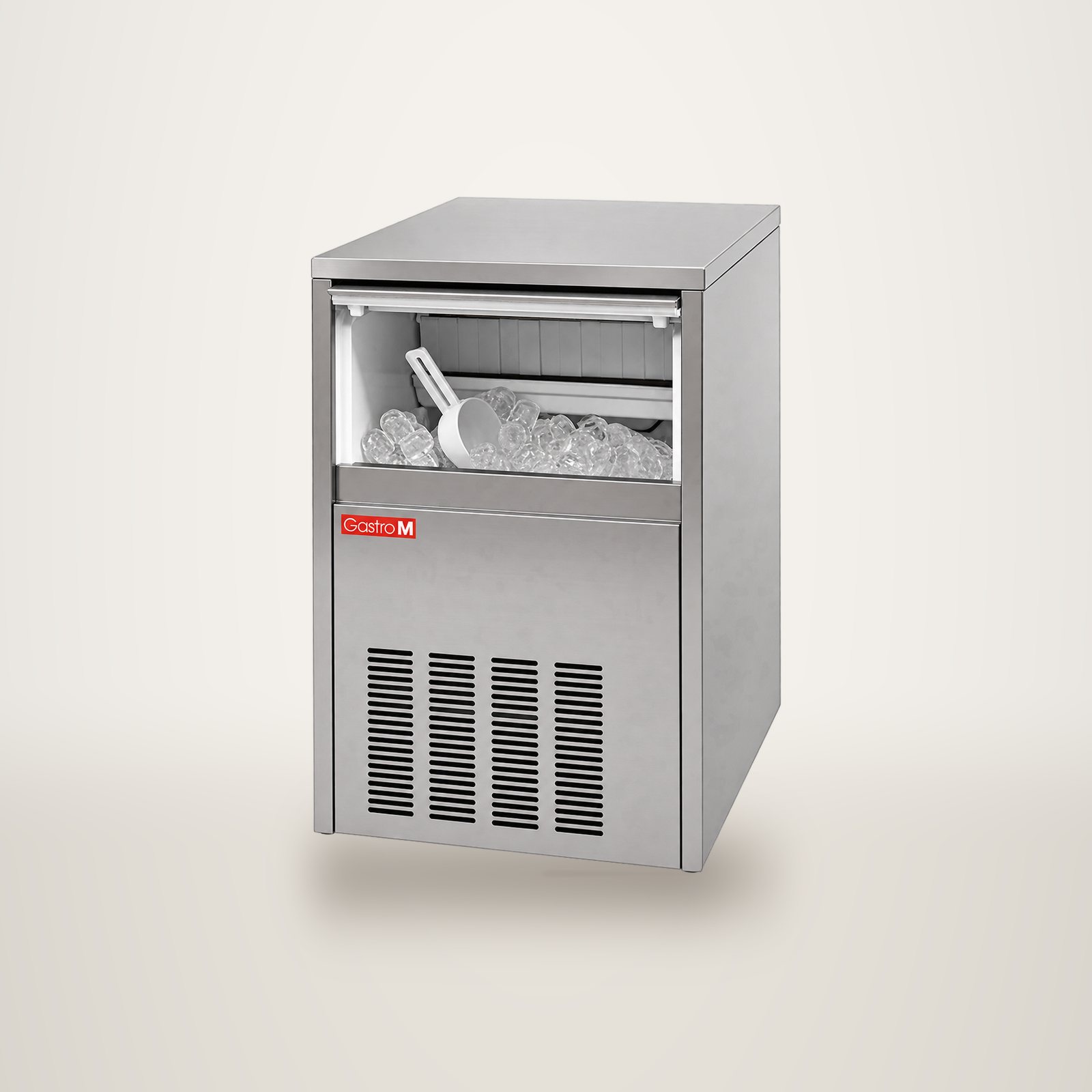 Machine à glaçons professionnelle en inox dont le bac ouvert contient des glaçons et une pelle blanche.