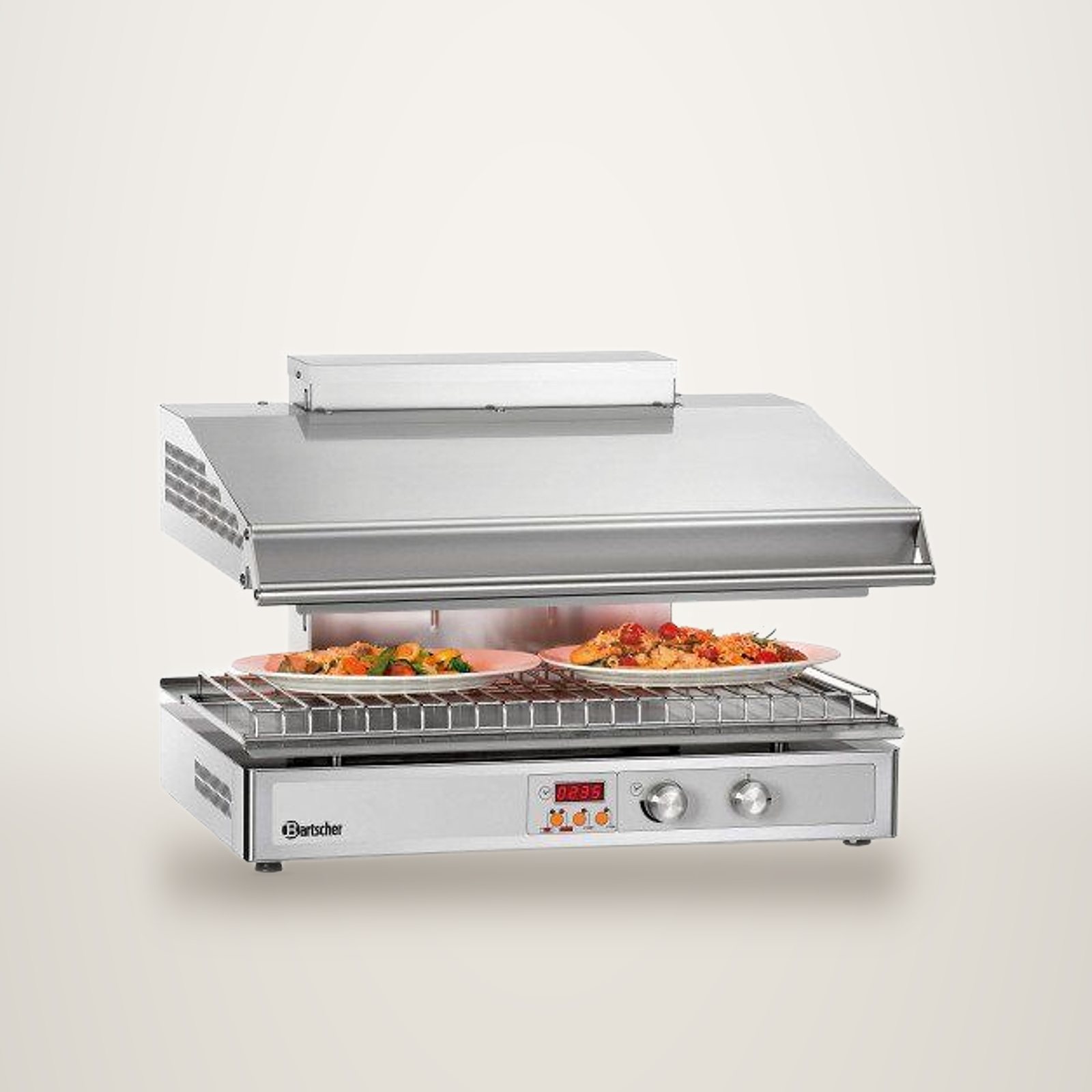 Salamandre professionnelle en inox gratinant deux assiettes de plats sur sa grille.